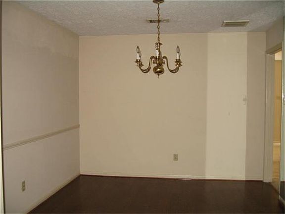 Formal Dining with Wood Floors.