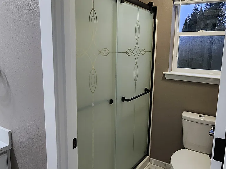 Master Bathroom with new shower entry.