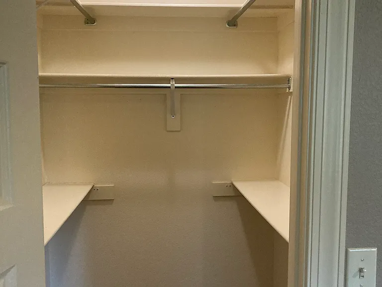 Medium Size Secondary Walk-In Closet