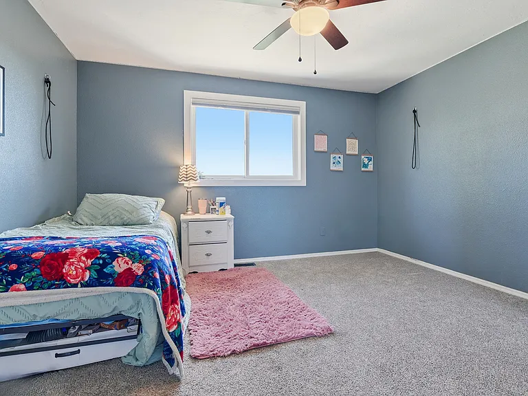 A versatile third bedroom that's perfect for a guest room, fitness space, gaming room, or private office.