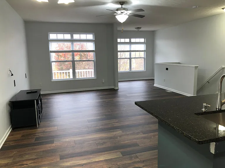 Spacious and open main living floor with walkout deck