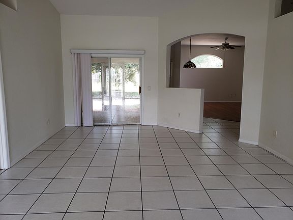 View from the front door, through living room, onto patio.