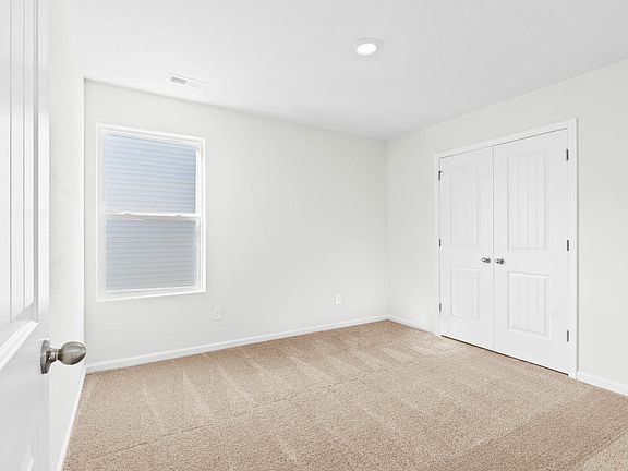 The master bedroom has plenty of size for your king-sized furniture