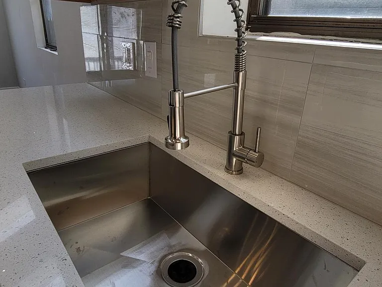 large compartment sink and premium kitchen faucet