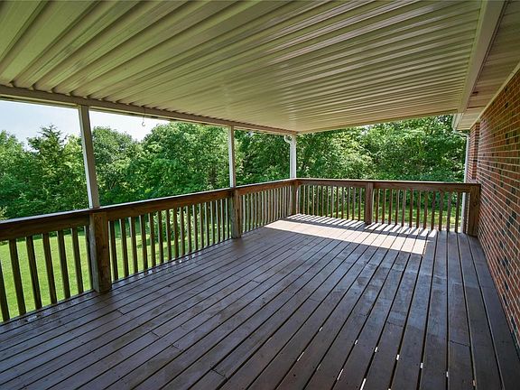 Covered Deck in the back overlooking the yard
