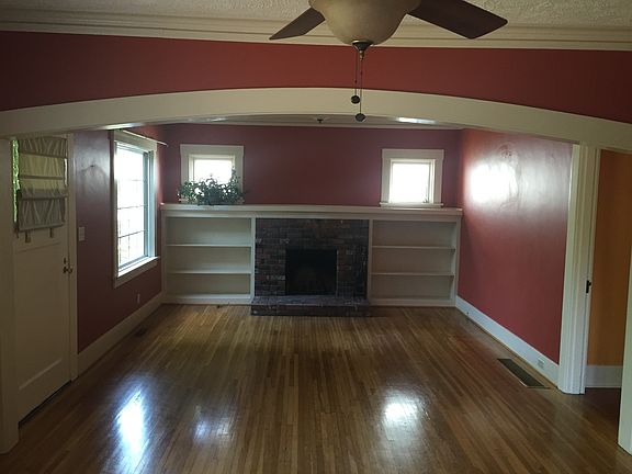 Living room with wood-burning fireplace