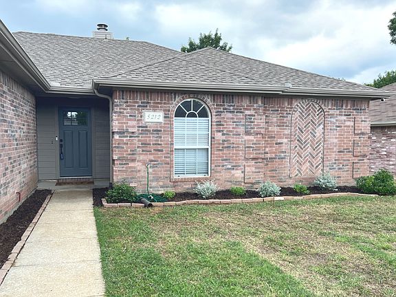 Front exterior, new front door and landscaping
