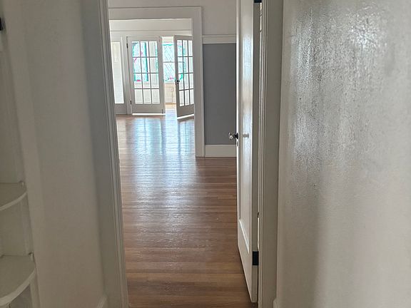 Hallway from bedroom leading to main part of apartment