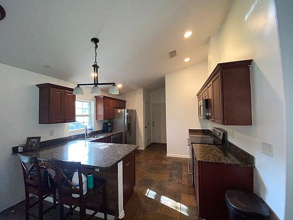 4th image of 8724 N Pitcairn Way