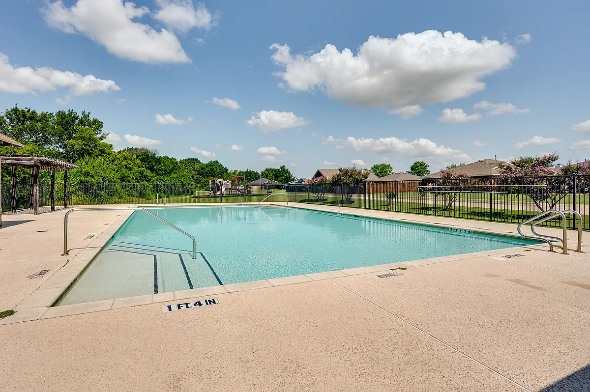The community has a wonderful pool. - Creekside Estates