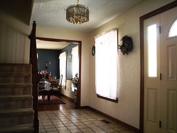 Tiled foyer to greet your guests in style