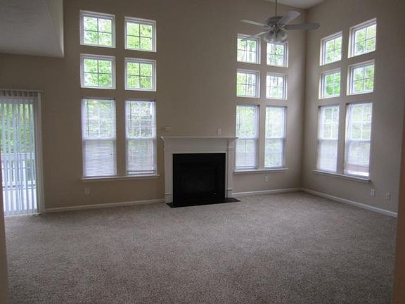 Living room with two story ceilings