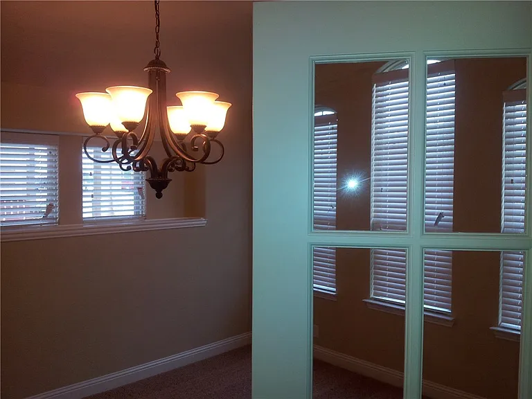 French door to office area. Could be used as office, gym and game room etc