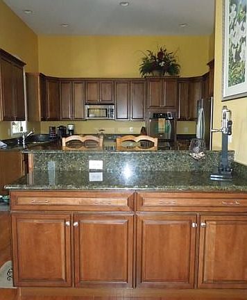 Room dividing cabinets w/granite countertops