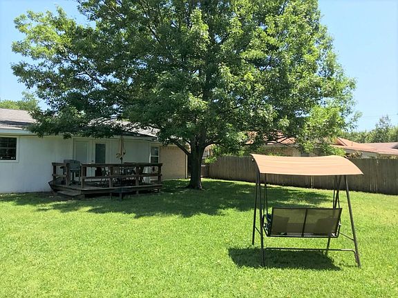 back of house w/ deck