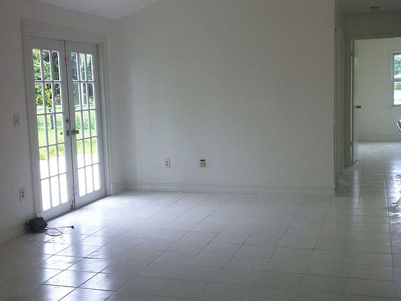 great family room with french door leading yard