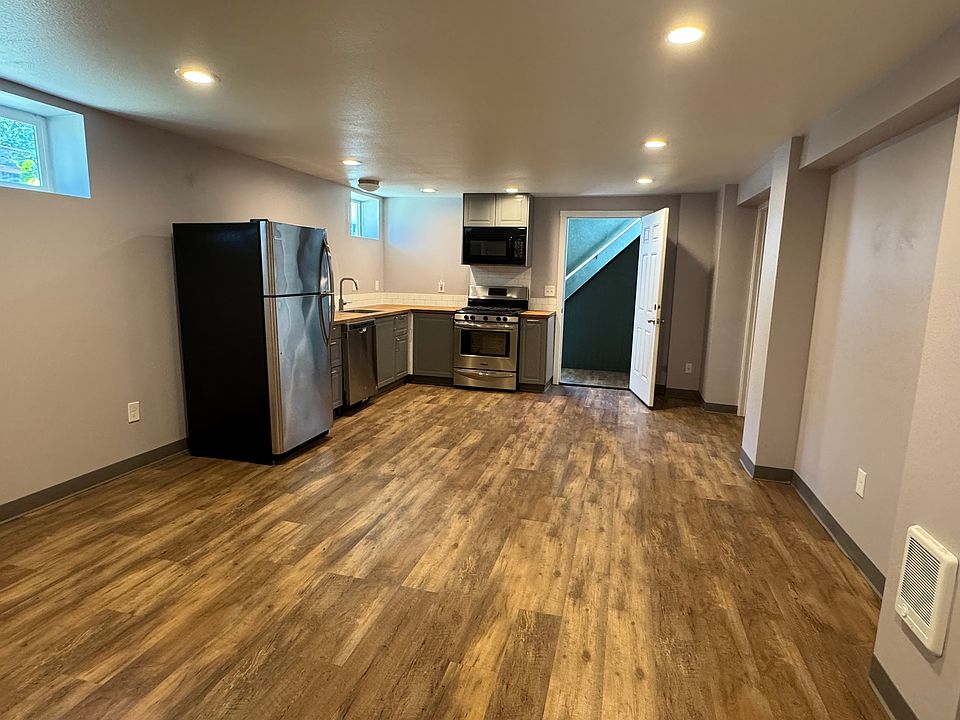 Open concept kitchen, living and dining area.