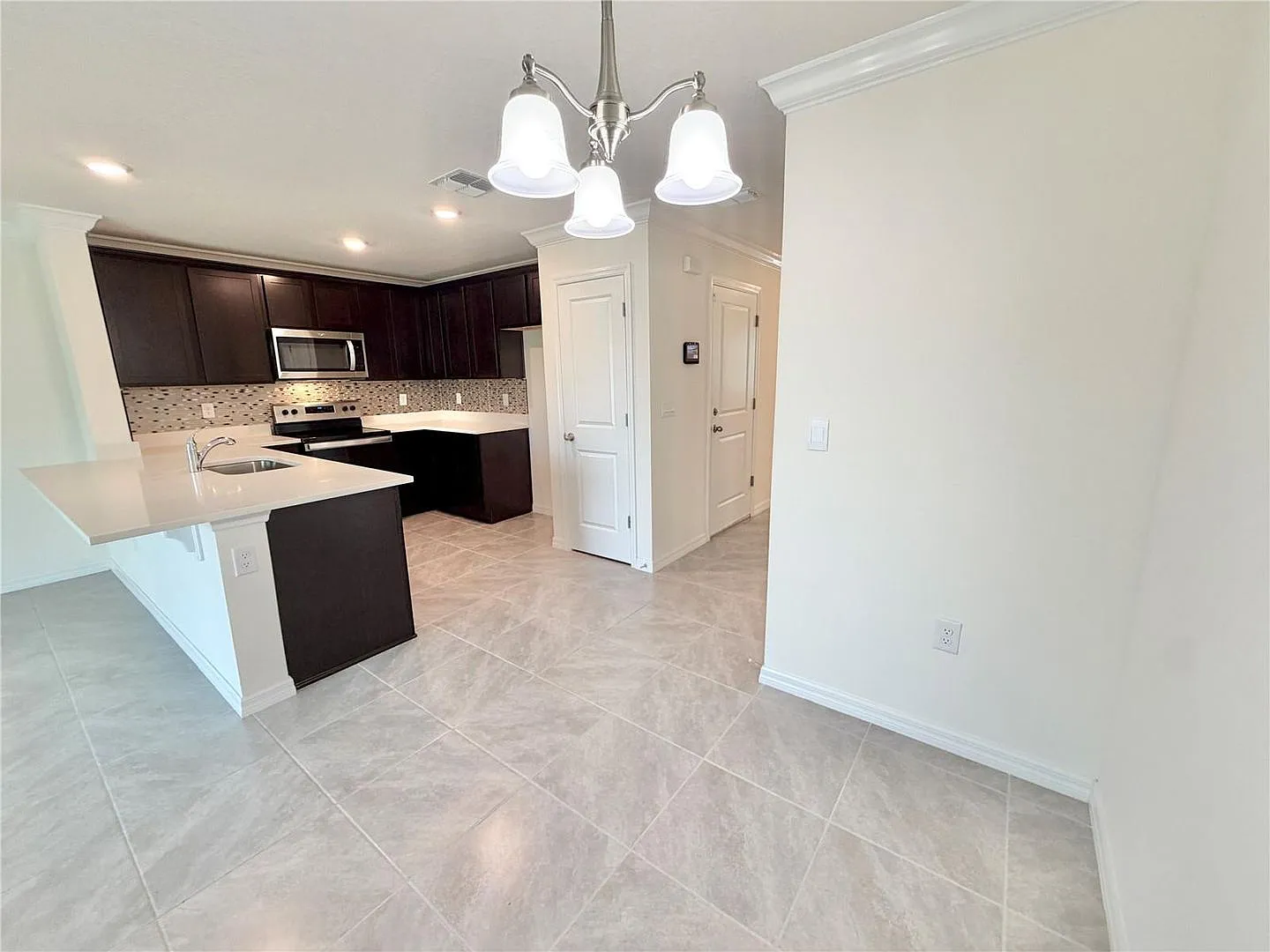 Modern 3-Bedroom Townhome with Upgrades & Green Space Views — Photo 4