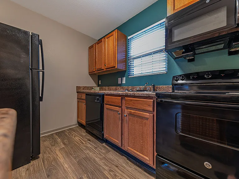 Step into elegance with this modern kitchen, blending functionality with style.
