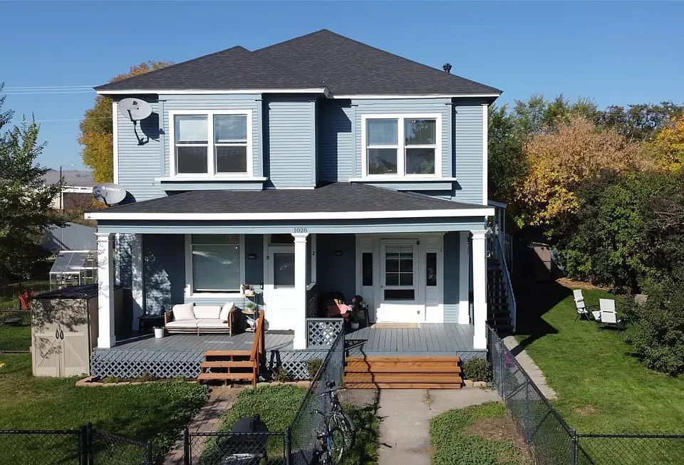 Street view. Unit is accessed through side yard.