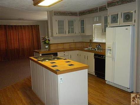 Kitchen with electric stove top in island