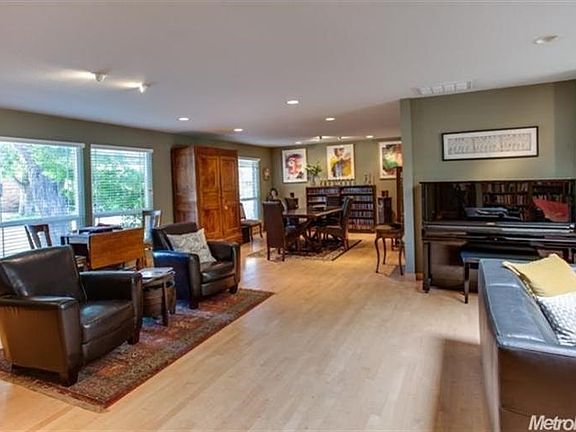 Newer wood flooring visually expands the space and provides easy-care living.