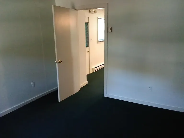 Bedroom entrance going into living room