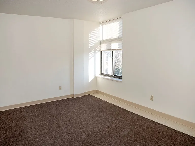 Carpeted Bedroom with Sunny Window