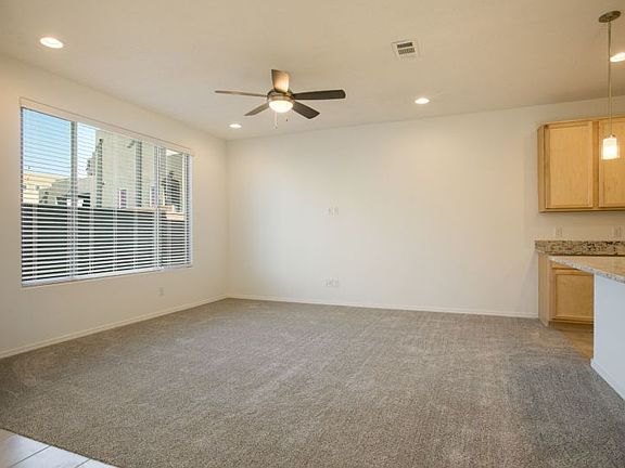 Gathering space features a large window for plenty of natural light.