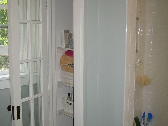 original detail, marble vanity, shower accents