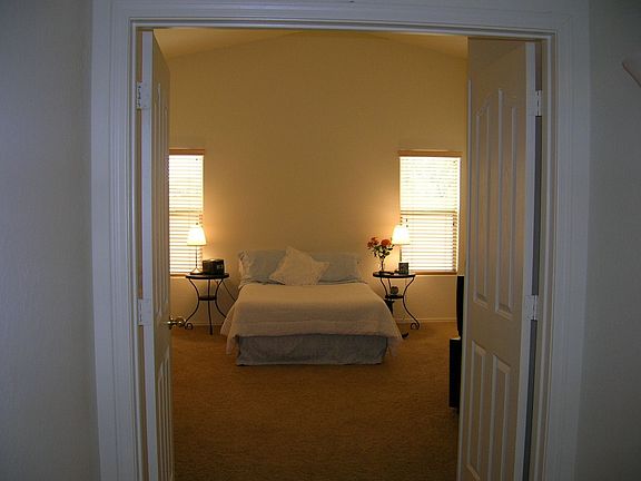 This master bedroom is one of the two master suites that you'll appreciate