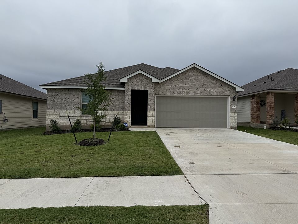 Fresh curb appeal, a roomy 2-car garage ?, and space to grow in a quiet neighborhood ?
