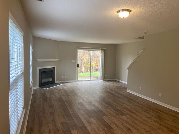 Open floor plan with private, wooded backyard.