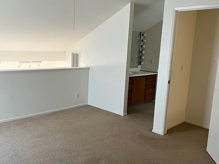 Lofted primary bedroom