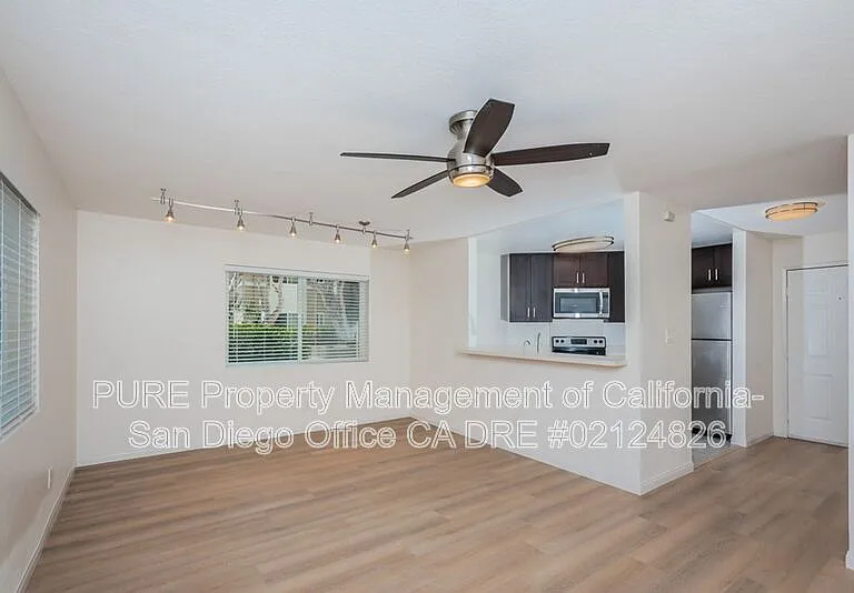 7565 Charmant Dr #515 — Photo 1