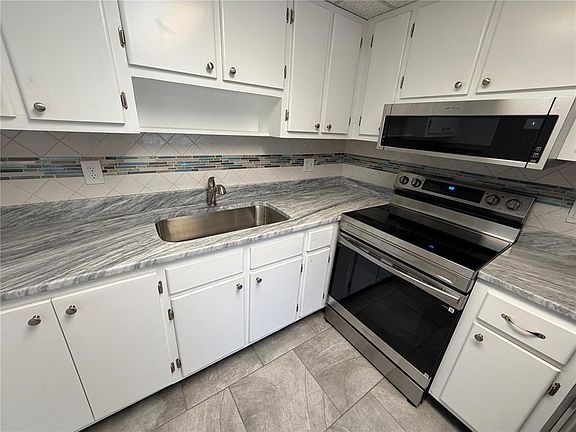 4th image of 8402 111th St APT 203