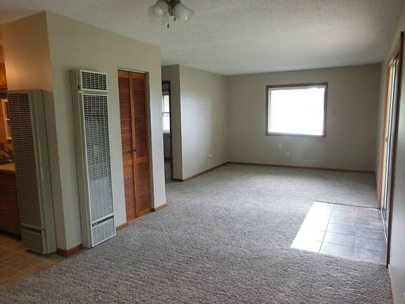 This wall furnace heats the entire home very efficiently. There is duct work going to the bedrooms.