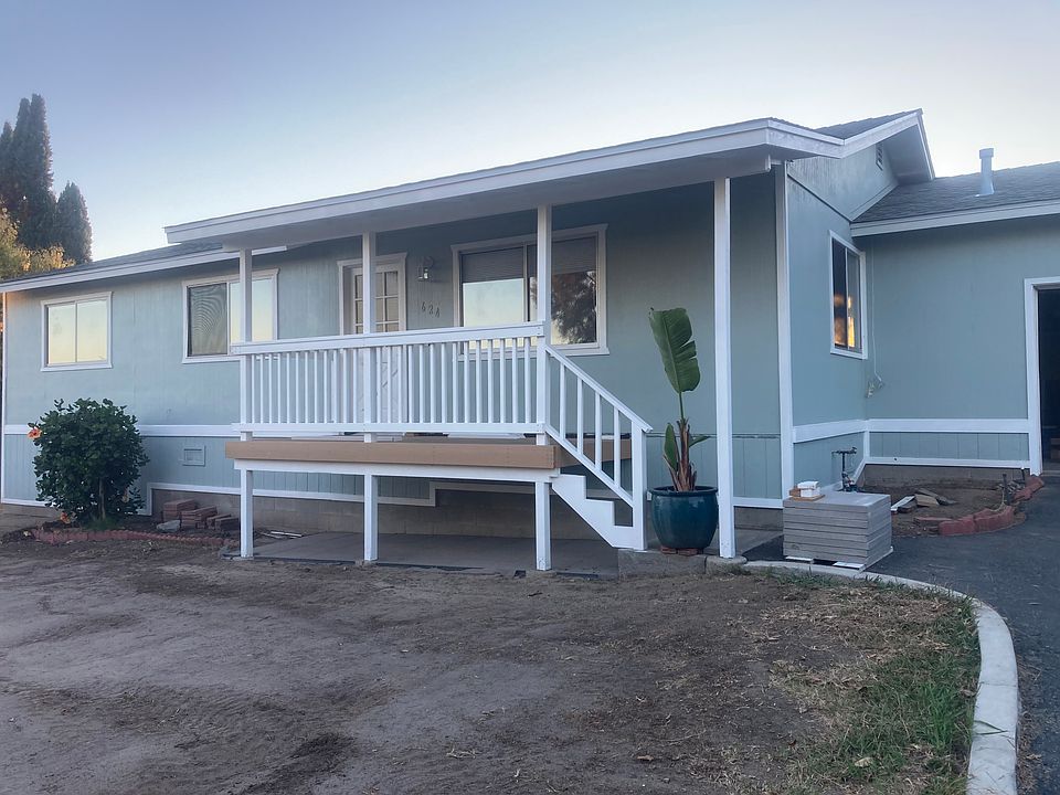 ranch style home with new roof, new front porch and all new paint. sod grass coming soon.