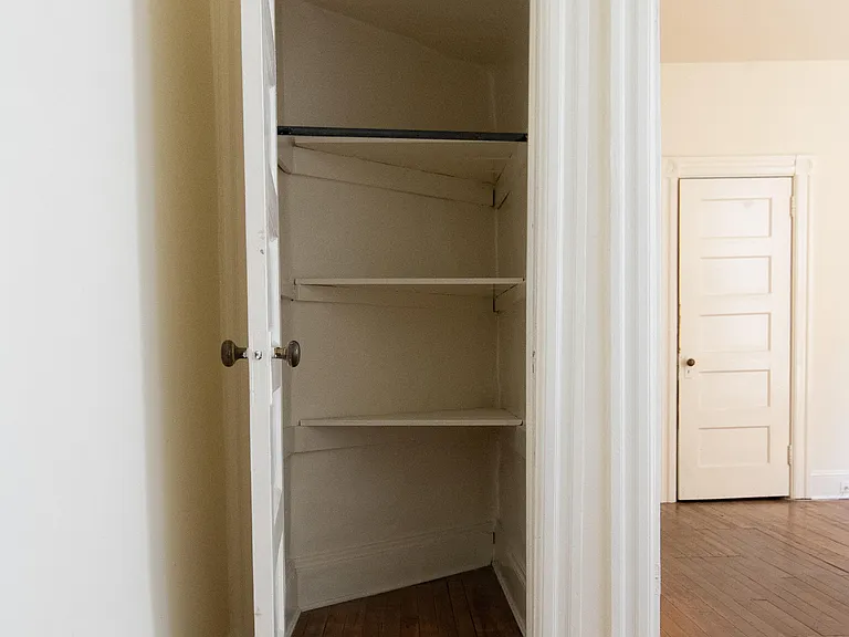 Bedroom 1. closet, view to Bedroom 2.