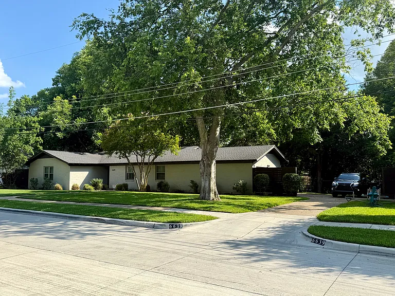 Parking space and oversized two-car garage.