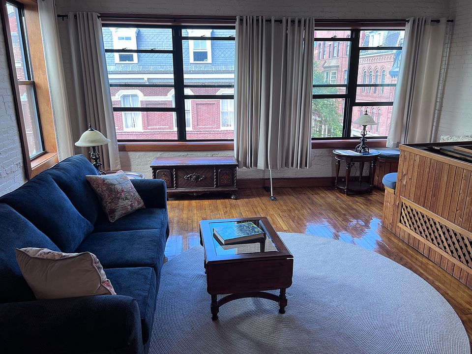 Note: If needed, New TV will be purchased and placed on wood platform facing couch