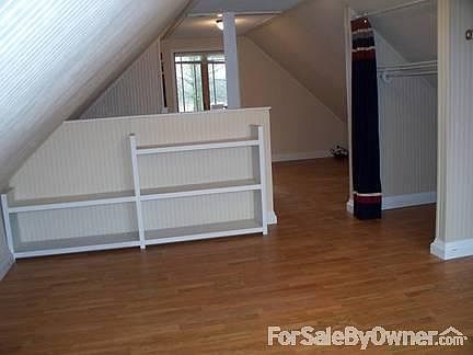 Upstairs bedroom/loft
						:
						new laminate floor Nov 2012
facing NW corner, closet 2, and office nook