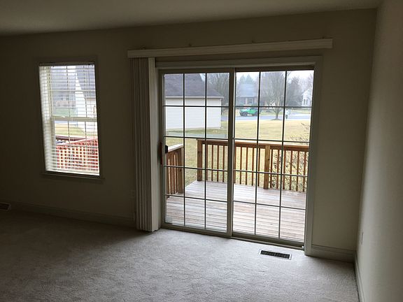 Living area w/ door to deck