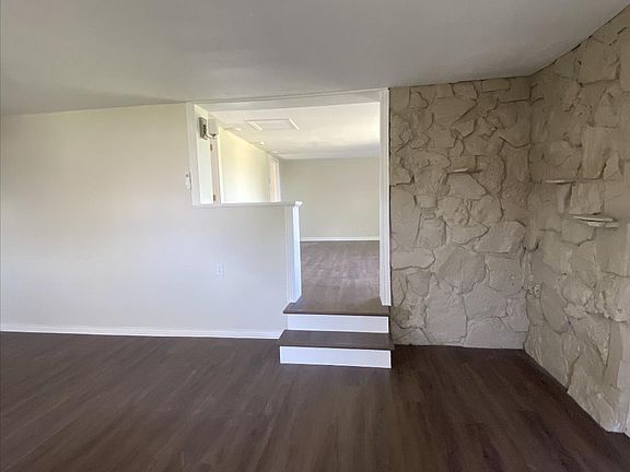 View from kitchen. Dining area up to the living room space.