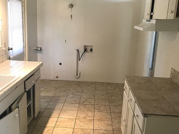 Kitchen with Laundry Area