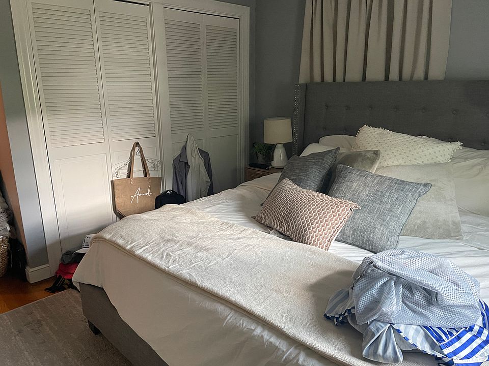 Main bedroom with view of wall to wall closet