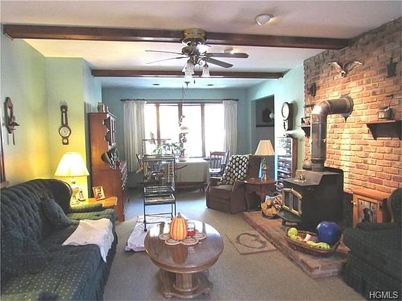Family Rm w/ wood burning stove & new Bay window