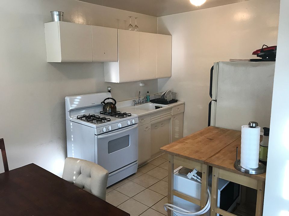 Modest kitchen (note, no dishwasher).