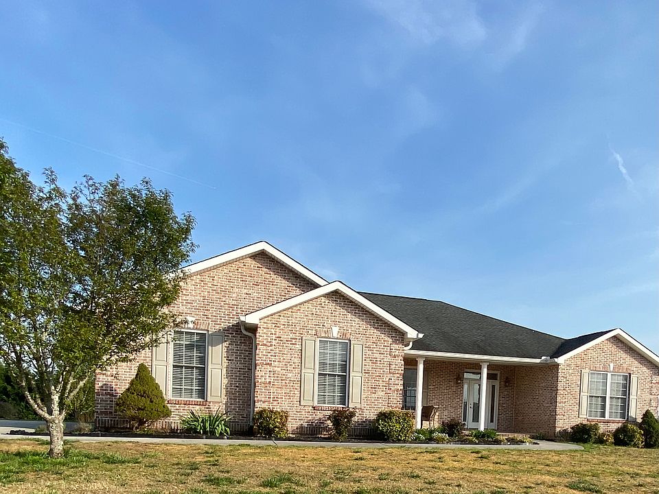 All brick home on a half acre lot (mowing is included in the rental)