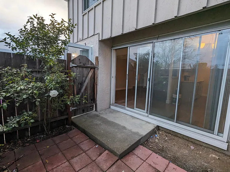 Private Patio opening to living room and kitchen